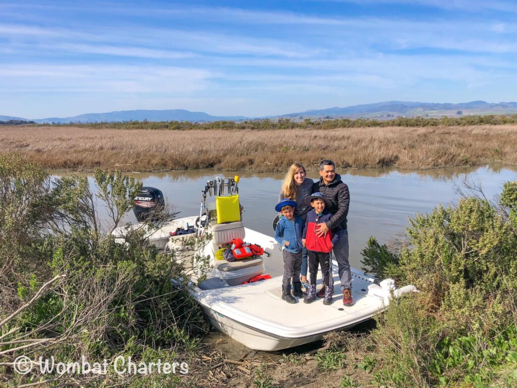 Family enjoying Napa River wetlands boat tour with Wombat Charters